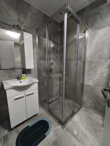 Koupelna v ubytování Aura apartment