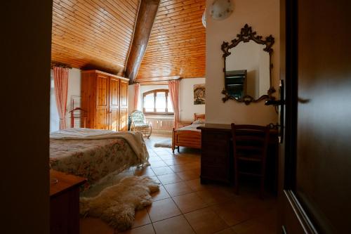 Postel nebo postele na pokoji v ubytování Ampio Bilocale con vista montagne, Ceres Centro