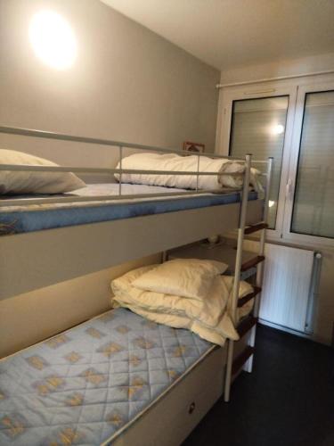 Un ou plusieurs lits dans un hébergement de l'établissement Altitude 1800 - maeva Home - Appartement 4 Pièces 8 personnes - Confort MAE-2791