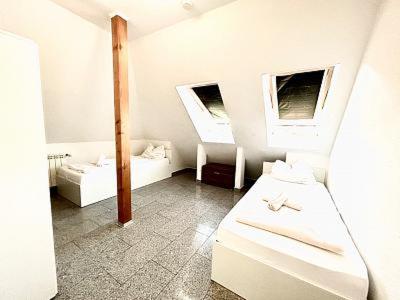 Giường trong phòng chung tại Apartment for 7 guests