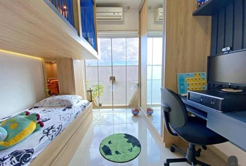 En eller flere senge i et værelse på Aconchego para Famílias