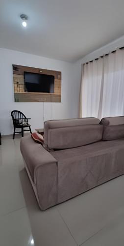 Et opholdsområde på Aconchego Barulho do Mar