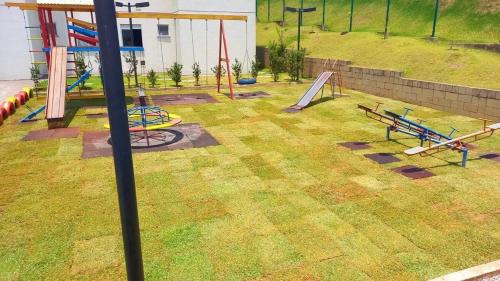 Kawasan permainan kanak-kanak di 15 minutos da praia ExpocentroCentro Greenvaley
