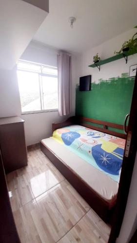 Katil atau katil-katil dalam bilik di 15 minutos da praia ExpocentroCentro Greenvaley
