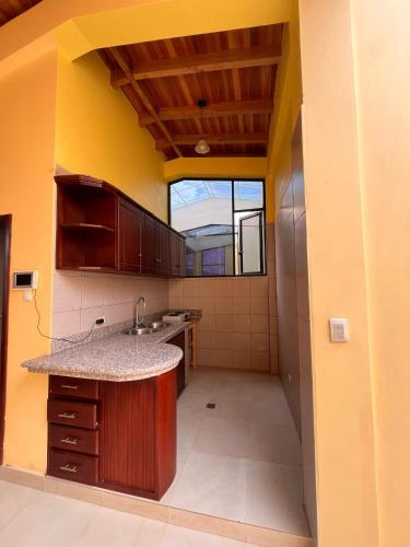 Kuchyň nebo kuchyňský kout v ubytování La Casa Ambateña