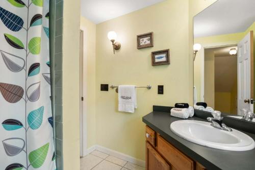 a bathroom with a sink and a shower at Walk to Water near Downtown Chatham in Chatham