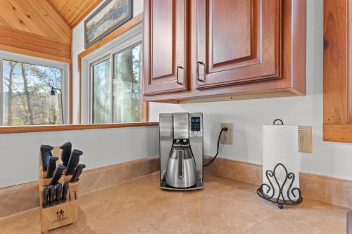 a kitchen with a coffee maker on the counter at Mountain Spirit in Stanton