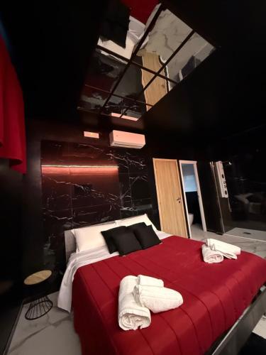 Postel nebo postele na pokoji v ubytování Il corso suite rooms