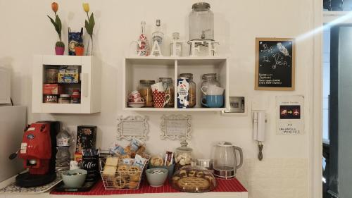 a kitchen with a counter with food on it at B&B IL POETA in Palermo