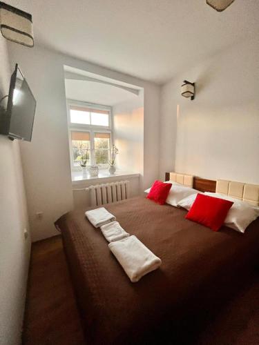 Postel nebo postele na pokoji v ubytování M&M apartamenty