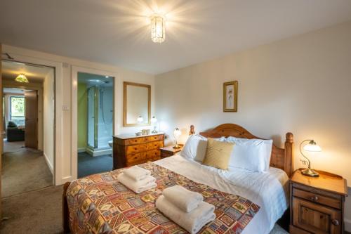 Raven Wing Apartments - Highland Club Scotlandにあるベッド
