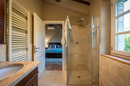 a bathroom with a shower and a sink at Villa Olivo by Great Stays in Città della Pieve