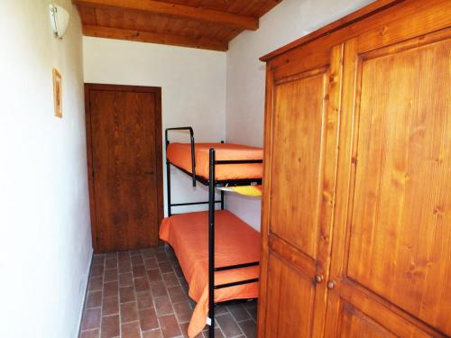 Giường trong phòng chung tại Agriturismo La Casa della Lavanda - Il Rustico