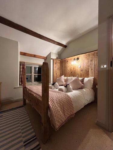 Postel nebo postele na pokoji v ubytování Pond Cottage