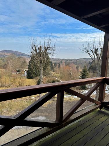 a view from the deck of a cabin with a view at Na Hřebenovce in Krompach