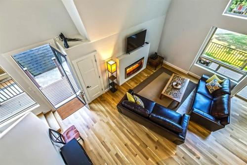 an overhead view of a living room with a couch and a tv at Sqe Mystic Grove in Sequim