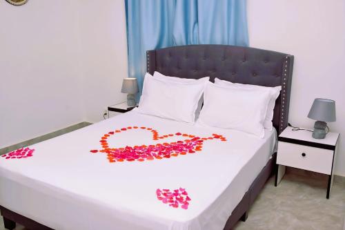 Una cama o camas en una habitación de Keur Adiana