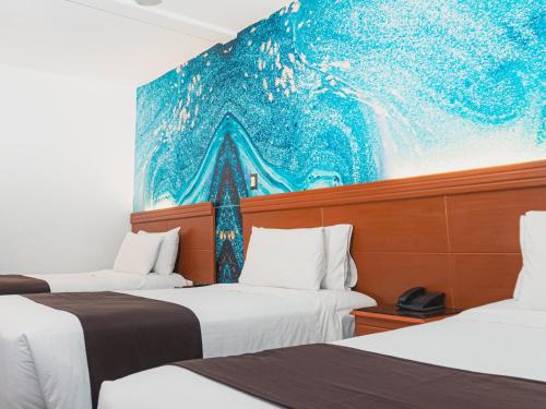 Postel nebo postele na pokoji v ubytování Hotel Ferré Machu Picchu