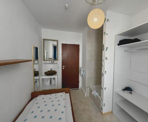 Postel nebo postele na pokoji v ubytování Hostel Heinzelmännchen