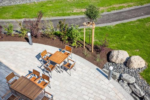 an overhead view of a patio with a table and chairs at Hierlhof in Immenstadt im Allgäu