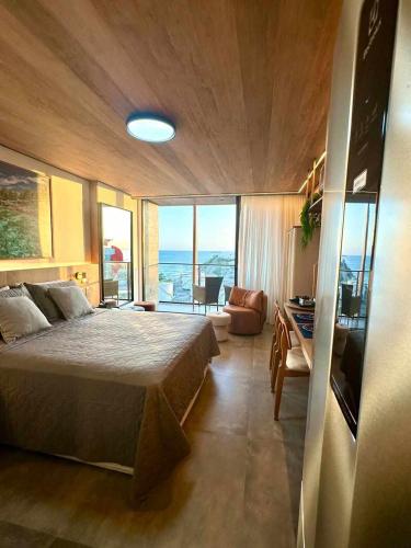 Katil atau katil-katil dalam bilik di Studio Beira Mar com Vista Mar NT1318