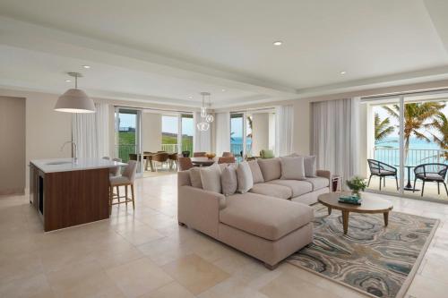 a living room with a couch and a table at The St. Regis Bermuda Resort in Saint George