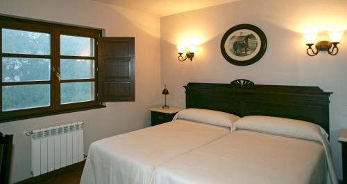 Postel nebo postele na pokoji v ubytování Hotel Rural Yeguada Albeitar