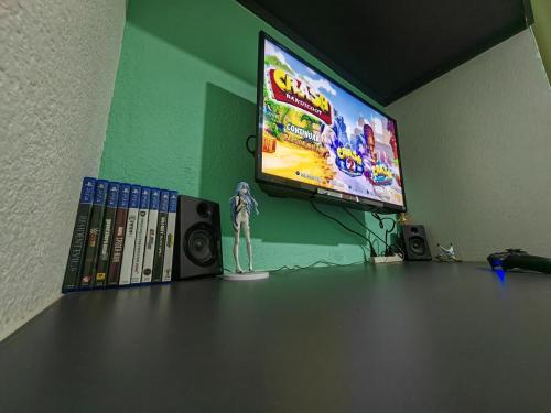 TV a/nebo společenská místnost v ubytování Sakura House
