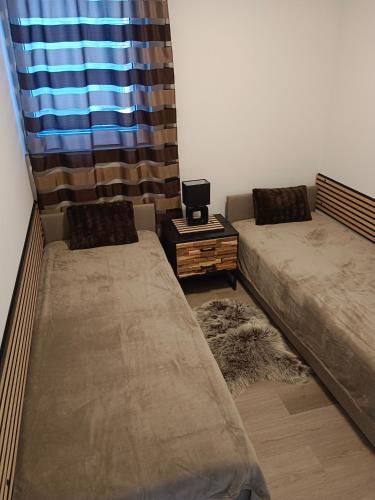 Μια τηλεόραση ή/και κέντρο ψυχαγωγίας στο Apartmánový dom Kocka
