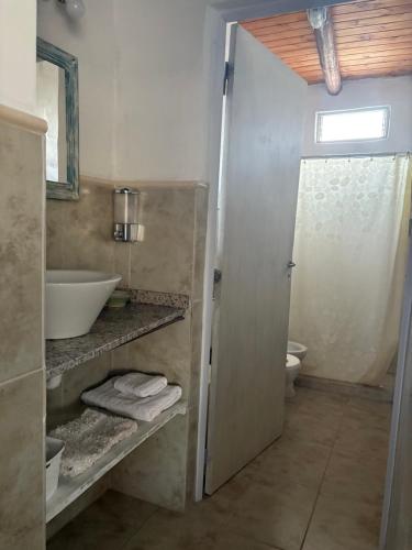 Ένα μπάνιο στο Cardozo House Monoambiente acogedor y familiar