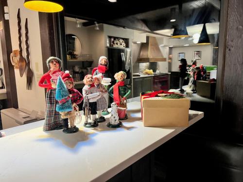 a group of dolls on a counter in a kitchen at RLL Breathtaking views and grand unique style in Dalton