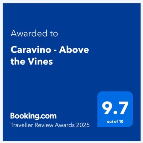 a blue sign with the text walked to caravina above the wines at Caravino - Above the Vines in Waikakaho