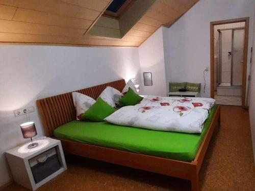 Postel nebo postele na pokoji v ubytování im Baumgarten Comfortable holiday residence