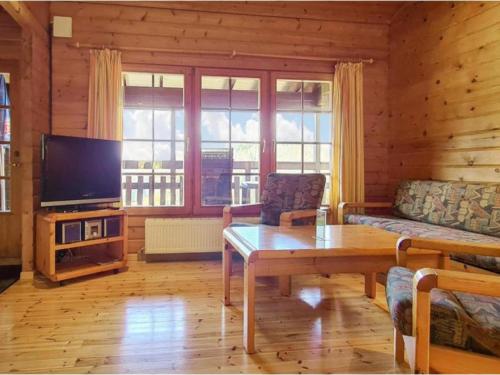 Μια τηλεόραση ή/και κέντρο ψυχαγωγίας στο Comfortable Home with Terrace