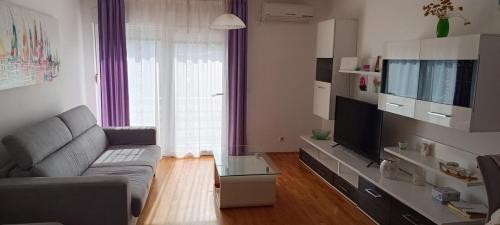 Apartments by the sea Banjol, Rab - 23094