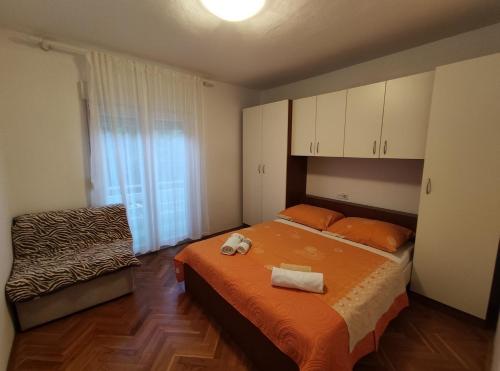 Apartments by the sea Banjol, Rab - 23094
