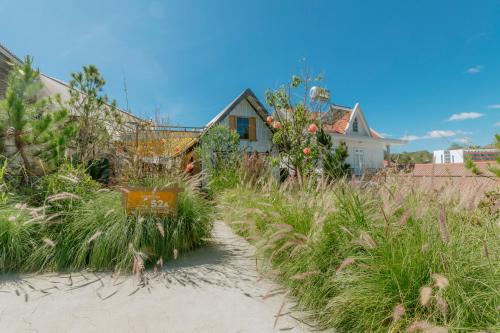 Φωτογραφία από το άλμπουμ του Homestay - Nhà Cỏ Lâu Đà Lạt σε Da Thien