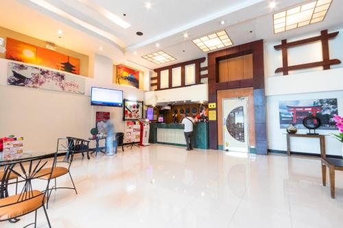 Hotel Sogo Santolanにあるレストランまたは飲食店