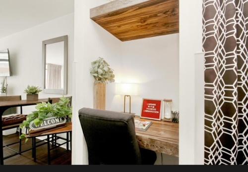 two images of a room with a desk and a chair at Ocean View 2 Queen Studio at Landmark Resort in Myrtle Beach