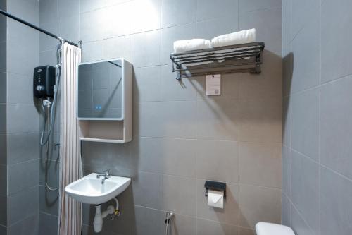 Koupelna v ubytování G Residence Sky Suite