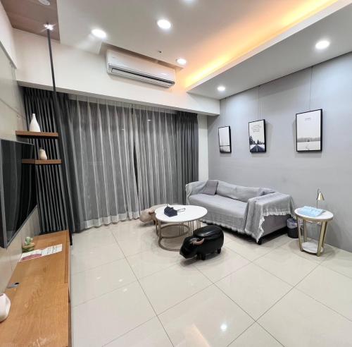 Fotografie z fotogalerie ubytování 枕浪觀星高樓夜景房3間房近漁光島免費車位 v destinaci Tchaj-nan