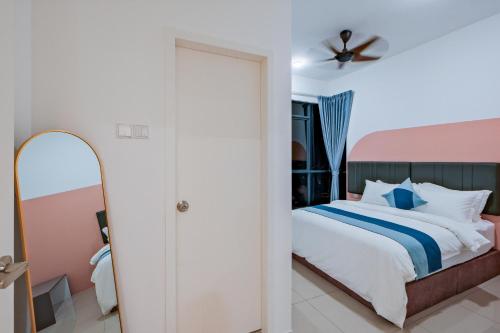 Postel nebo postele na pokoji v ubytování G Residence Sky Suite