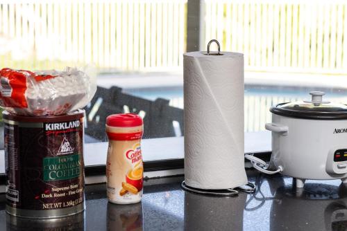 a roll of paper towels sitting on top of a counter at Off Grid Mountaintop Paradise Pool Spa and Games in San Bernardino