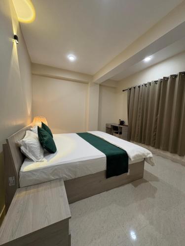 Postel nebo postele na pokoji v ubytování A Cube Homes