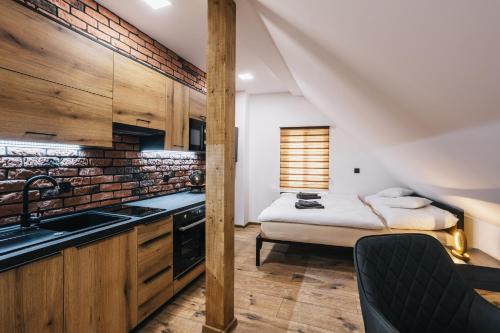 Kuchyň nebo kuchyňský kout v ubytování Apartmány U Doskočilů