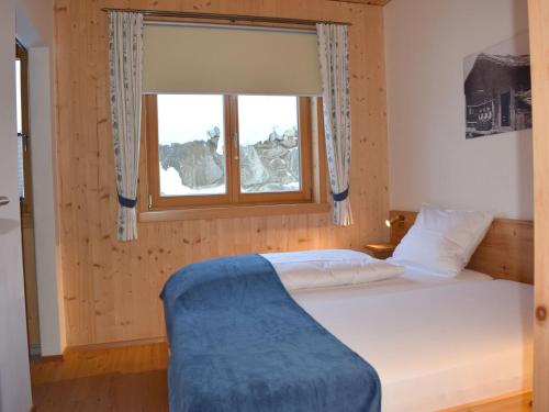 Ένα ή περισσότερα κρεβάτια σε δωμάτιο στο Apartment in Kals near Ski Slopes