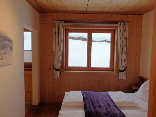 Ένα ή περισσότερα κρεβάτια σε δωμάτιο στο Apartment in Kals near Ski Slopes