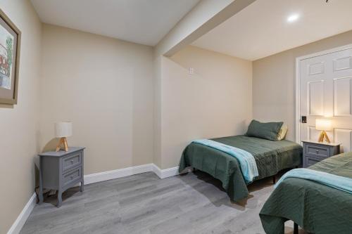 a bedroom with two twin beds and a bed sidx sidx sidx sidx sidx at Secluded 9BR Getaway, Pool, Hot Tub & Huge Deck in Chester