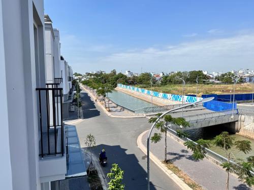 a balcony of a building with a view of a street at Lá Riverside Boutique Hotel in Mỹ Phước