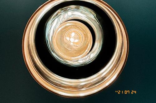 a close up of a glass plate with acedescedescedescedescedescedescedes at Little Ryukyu Hermit Crab Homestay in Xiaoliuqiu